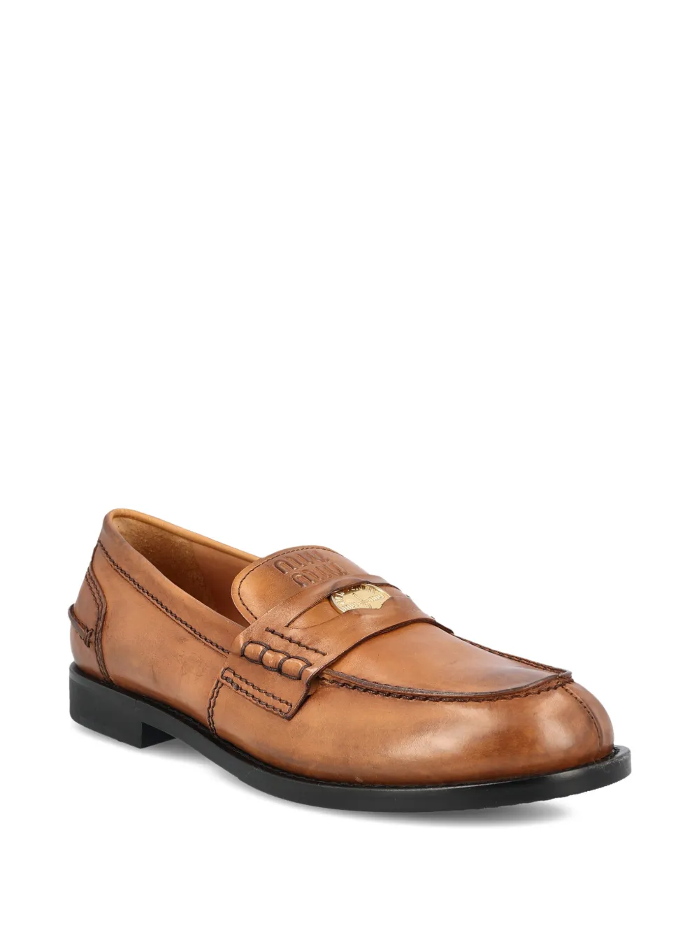 Miu Miu Loafers met reliëf en applicatie - Bruin