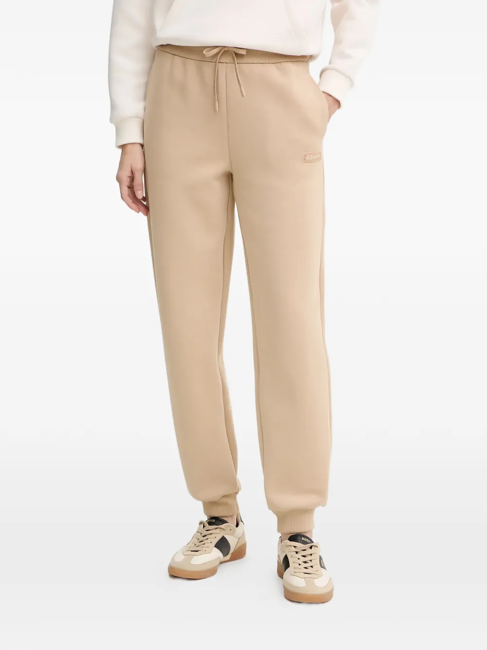 Armani Exchange logo-patch trousers - Toni neutri