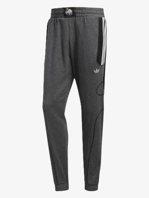 adidas pants con rayas laterales