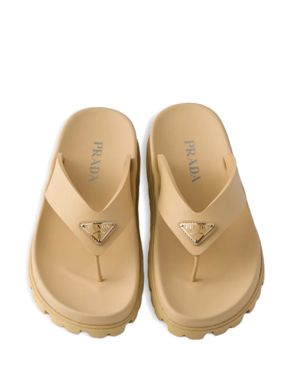 Prada Teenslippers met logoplakkaat Beige