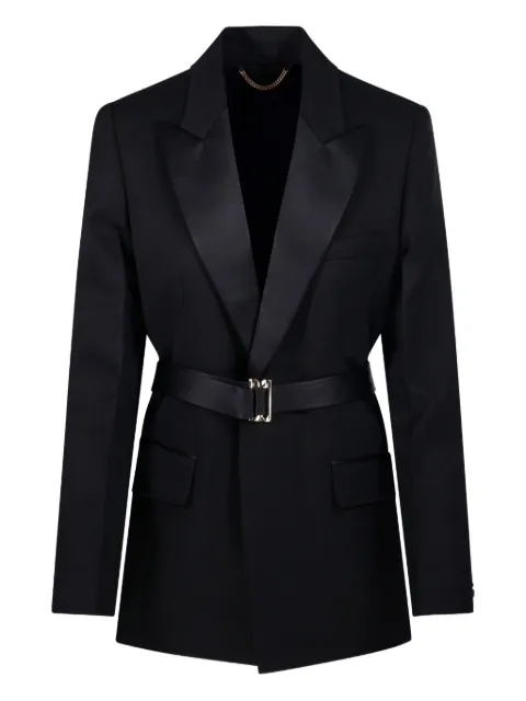 Victoria Beckham chamarra con cinturón y solapas de pico