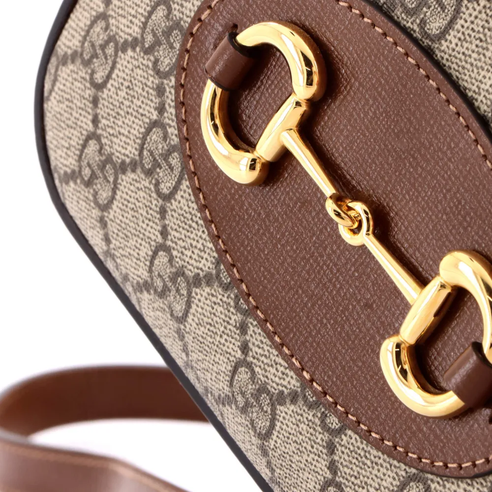 Gucci Pre-Owned Borsa a tracolla Horsebit 1955 piccola in tela cerata GG e pelle - Marrone