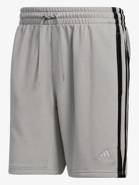 adidas pants con motivo de tres rayas