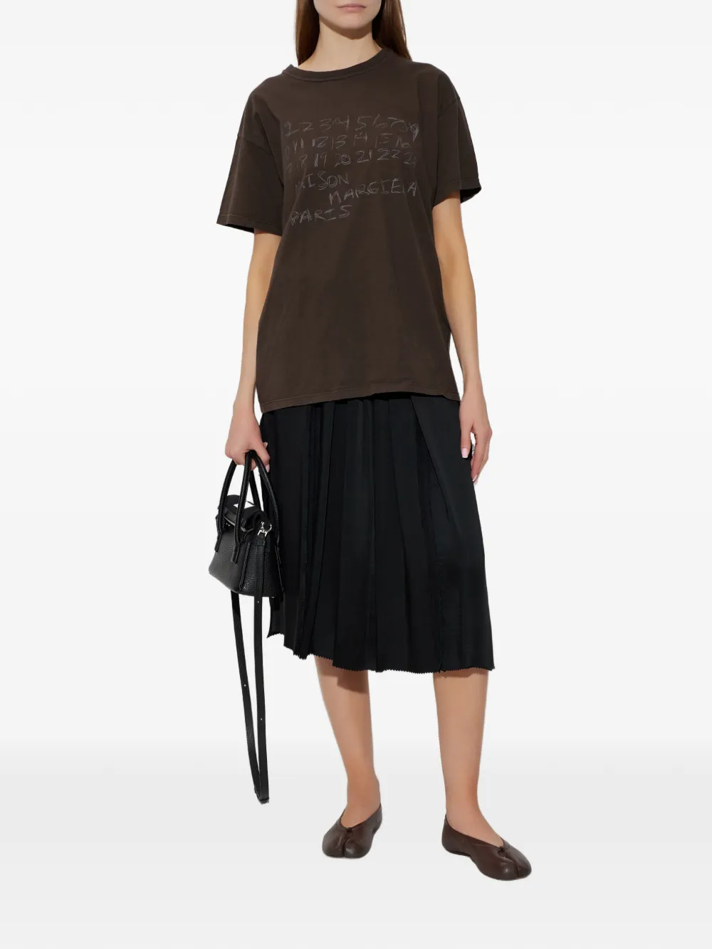 Maison Margiela pleated raw-cut midi skirt - Zwart