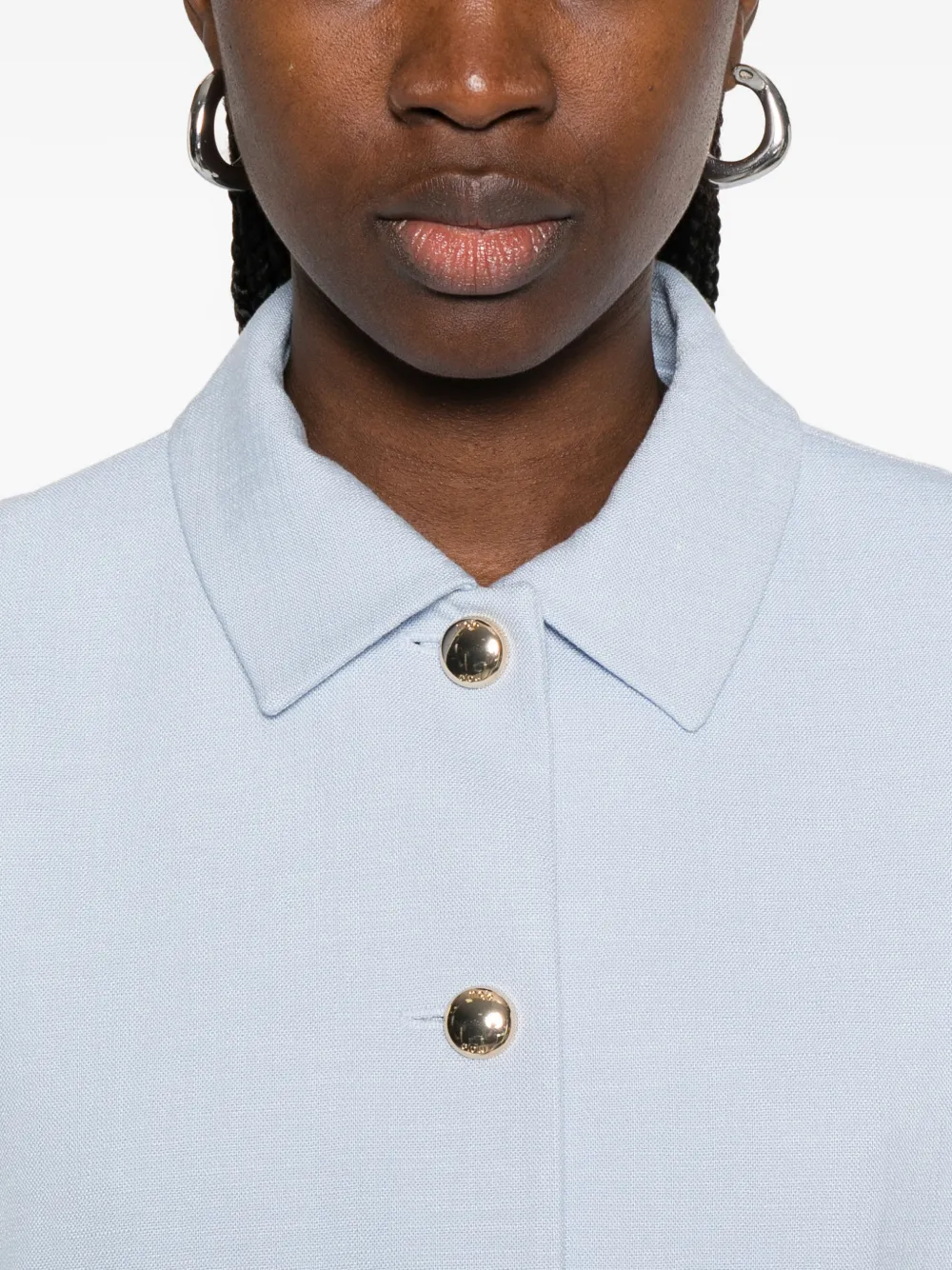 Maje Jack met knoopsluiting en zak aan de voorkant Blauw