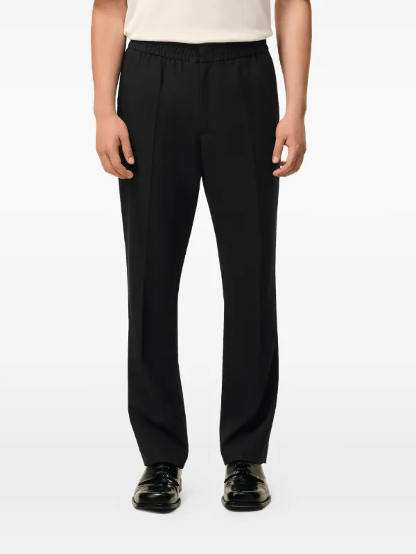 AMI Paris Wool Elasticated Waist Trousers | Black | FARFETCH