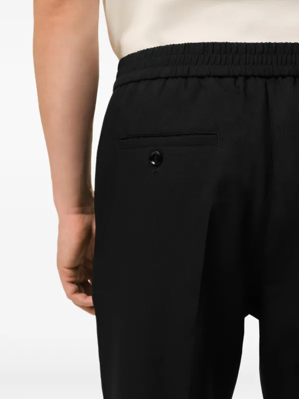 AMI Paris Wool Elasticated Waist Trousers | Black | FARFETCH