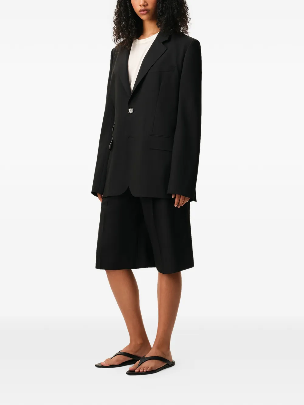 AMI Paris Boxy jack blazer met enkele rij knopen Zwart