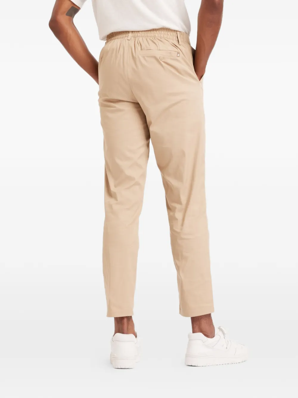 New Balance Athletics Standard 30" broek met toelopende pijpen Beige