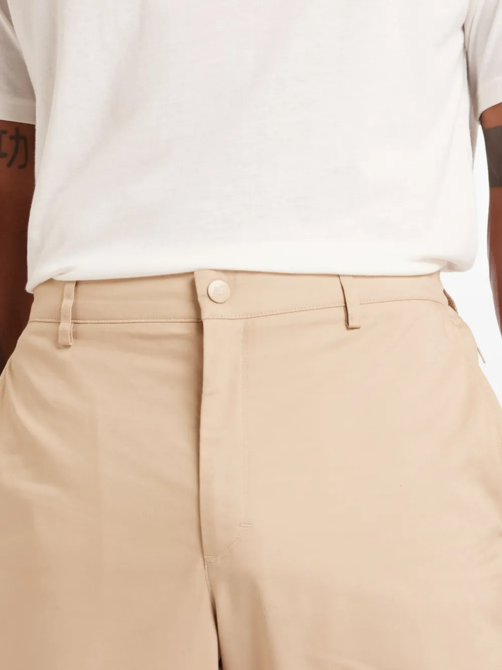 New Balance Athletics Standard 30" broek met toelopende pijpen Beige