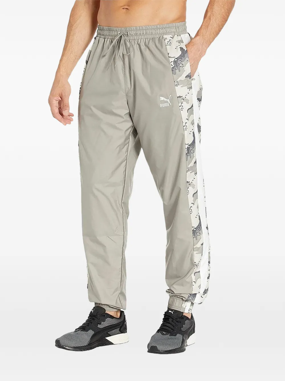 PUMA Pantaloni sportivi Wild Pack - Grigio