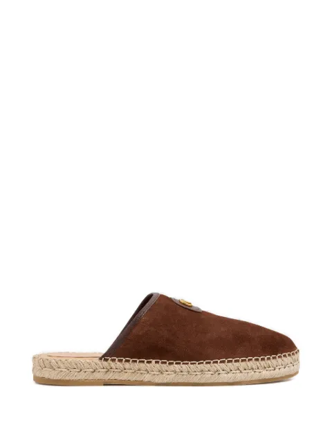 Valentino Garavani mules planos con placa del logo