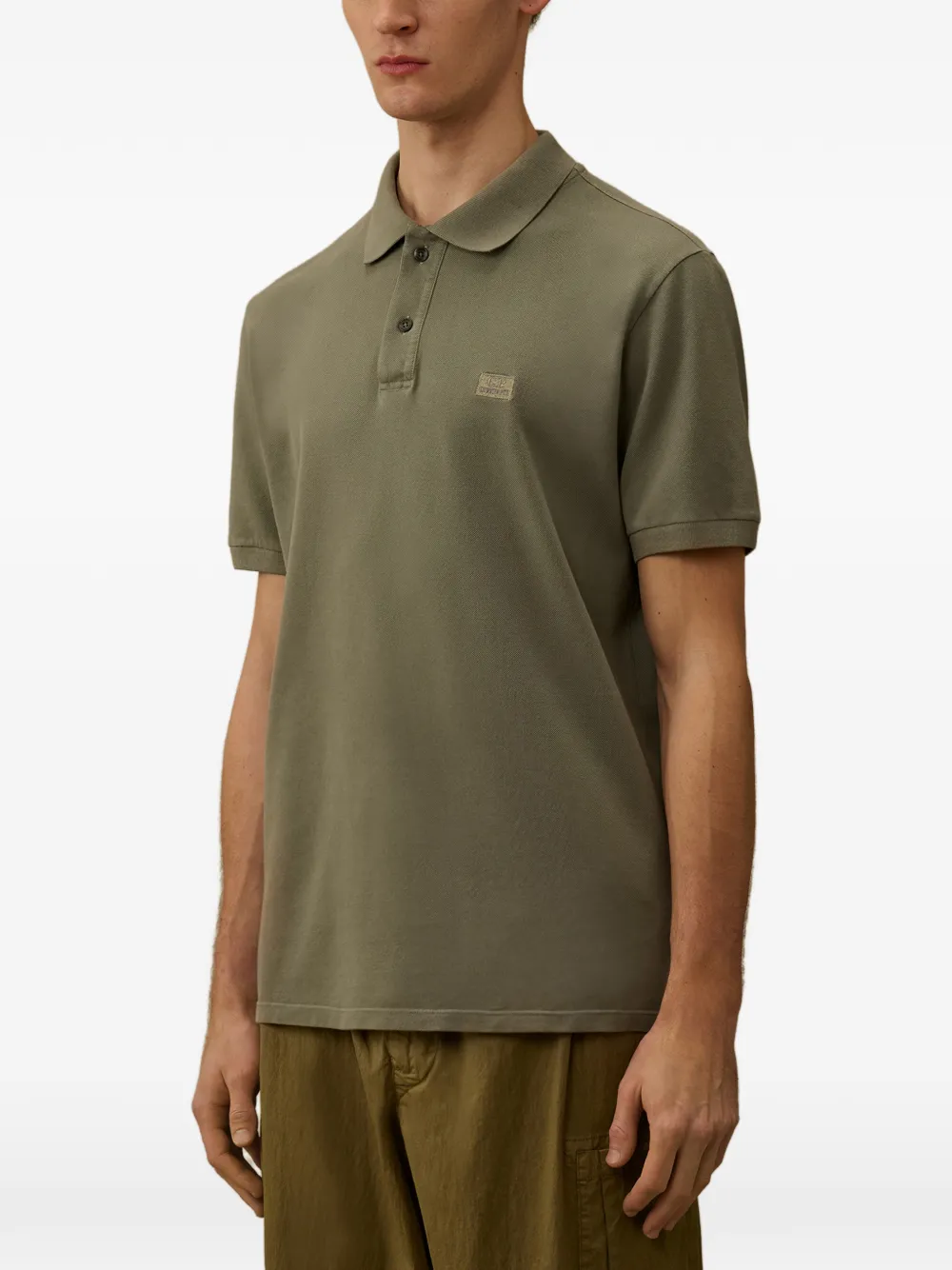 C.P. Company Poloshirt met logodetail en knopen Groen