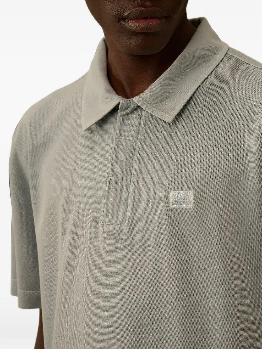 C.P. Company 24 1 katoenen poloshirt met korte mouwen en logopatch Grijs