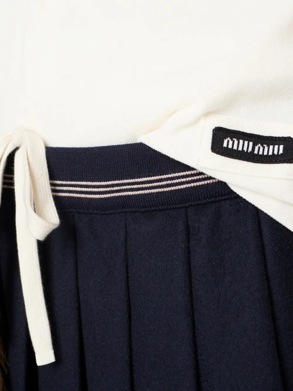 Miu Poloshirt met rits en geribbelde afwerking Wit