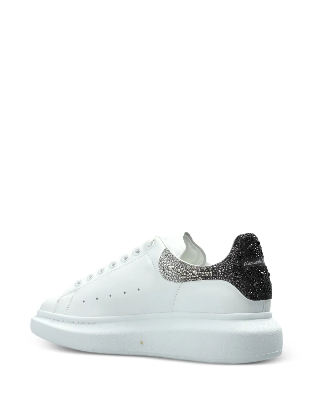 Alexander McQueen Sneakers met verfraaide hak Wit