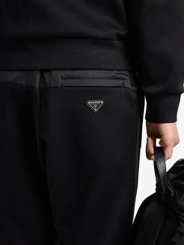 Prada logo-plaque Trousers | Black | FARFETCH