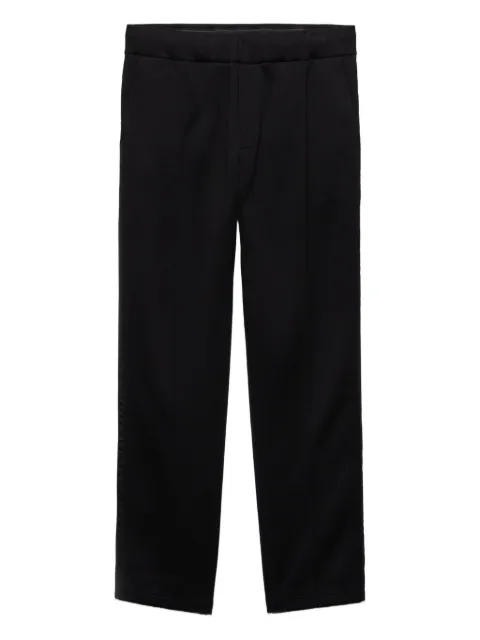 Prada logo-plaque trousers