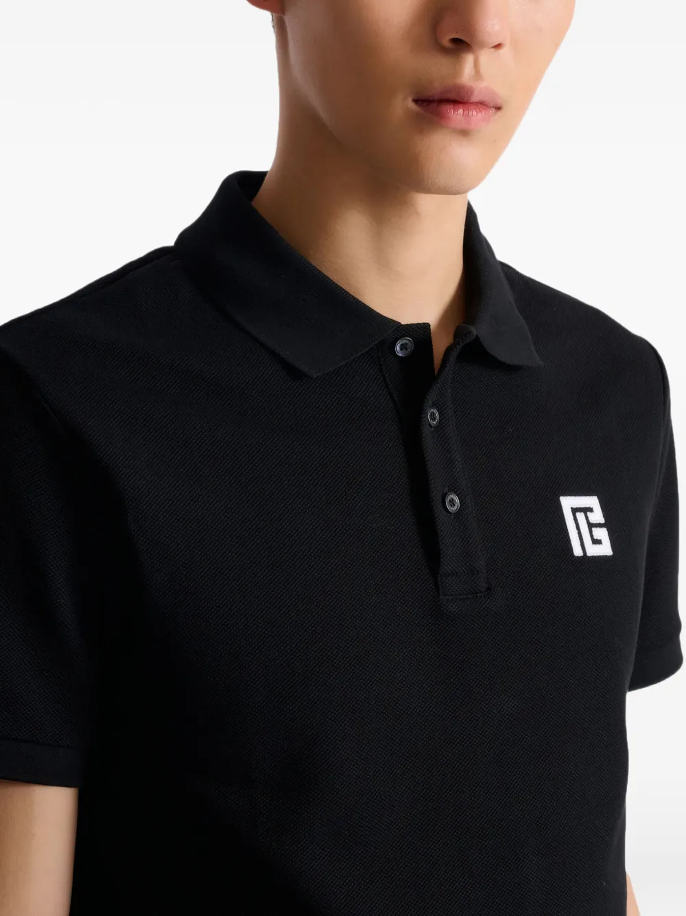 Balmain Poloshirt met geborduurd logo Zwart
