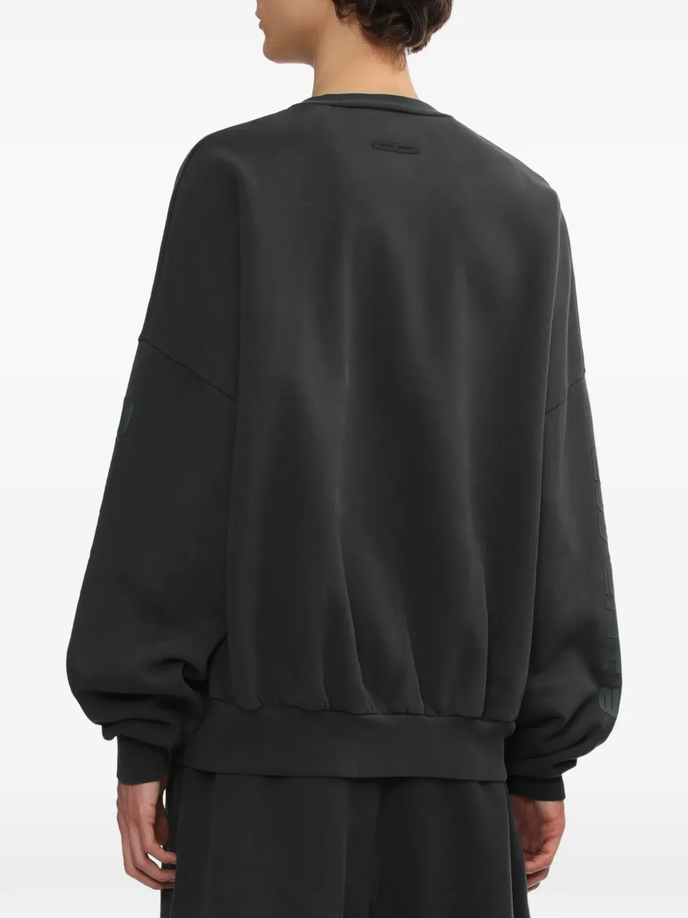 FEAR OF GOD ESSENTIALS Cropped sweater met logoprint Zwart