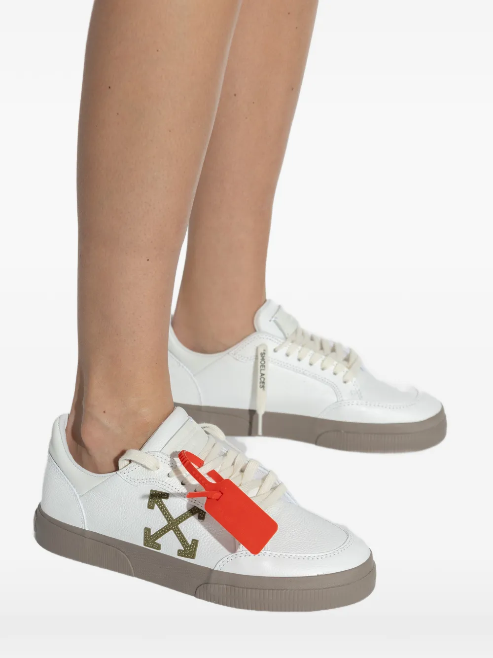 Off-White arrow-appliqué leather sneakers Wit