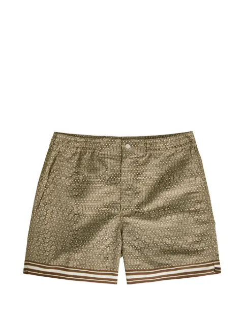 CHÉ Lucena patterned swim shorts