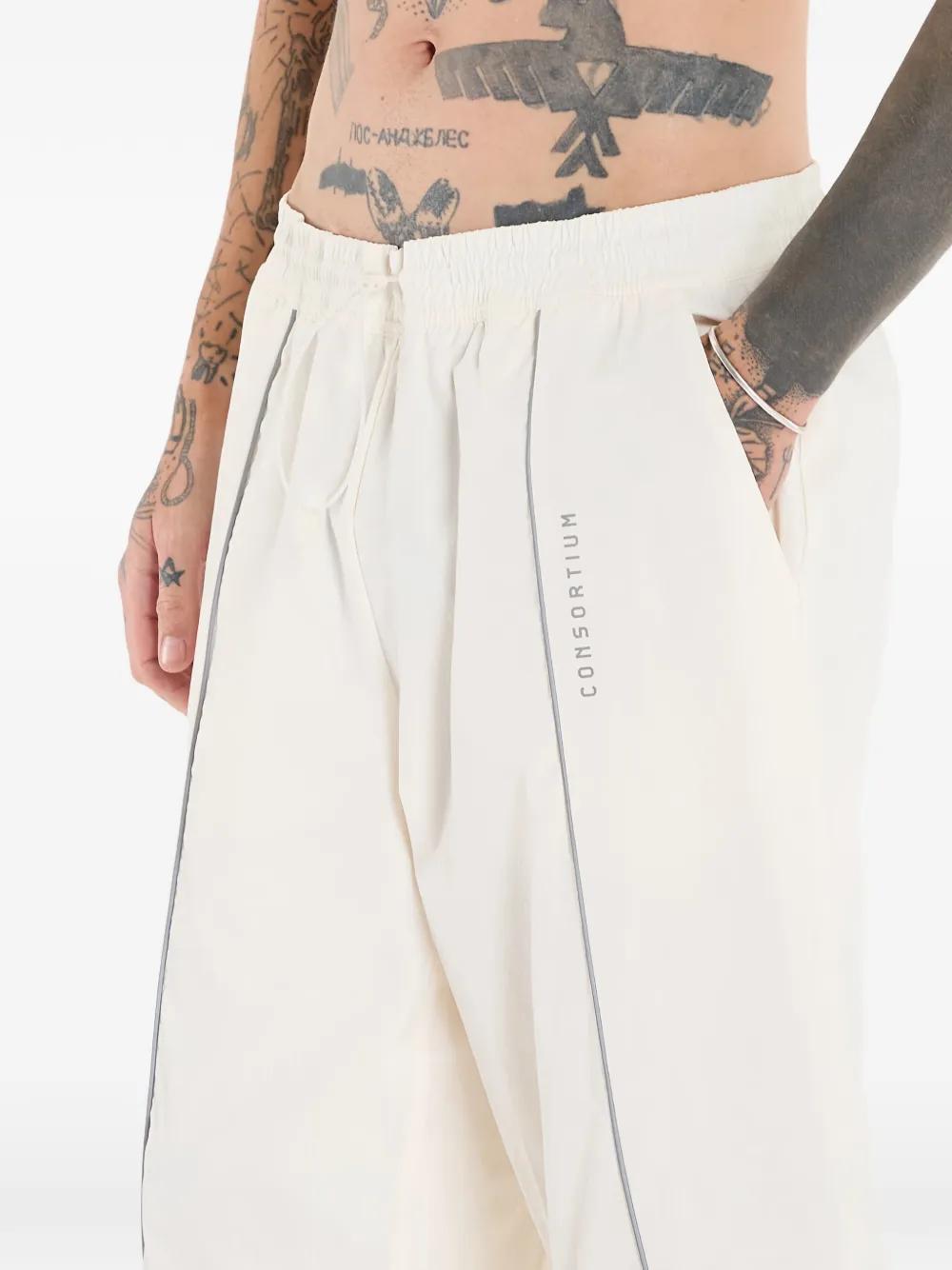 adidas x Consortium trainingsbroek met streepdetail Beige