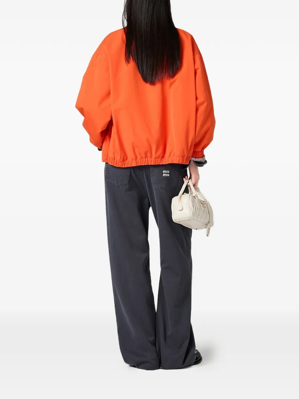 Miu Jack met logodetail en rits Oranje