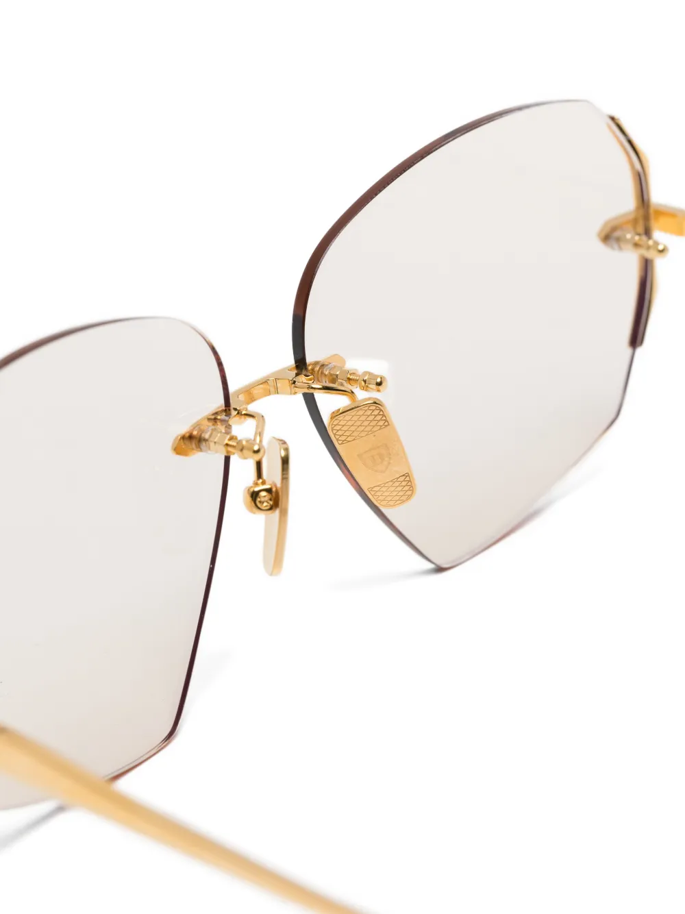 Dita Eyewear Zonnebril met geometrisch randloos montuur Goud