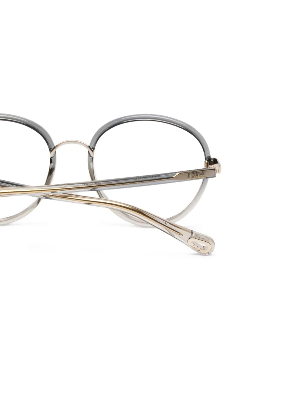 Chloé Eyewear Bril met rond montuur Grijs
