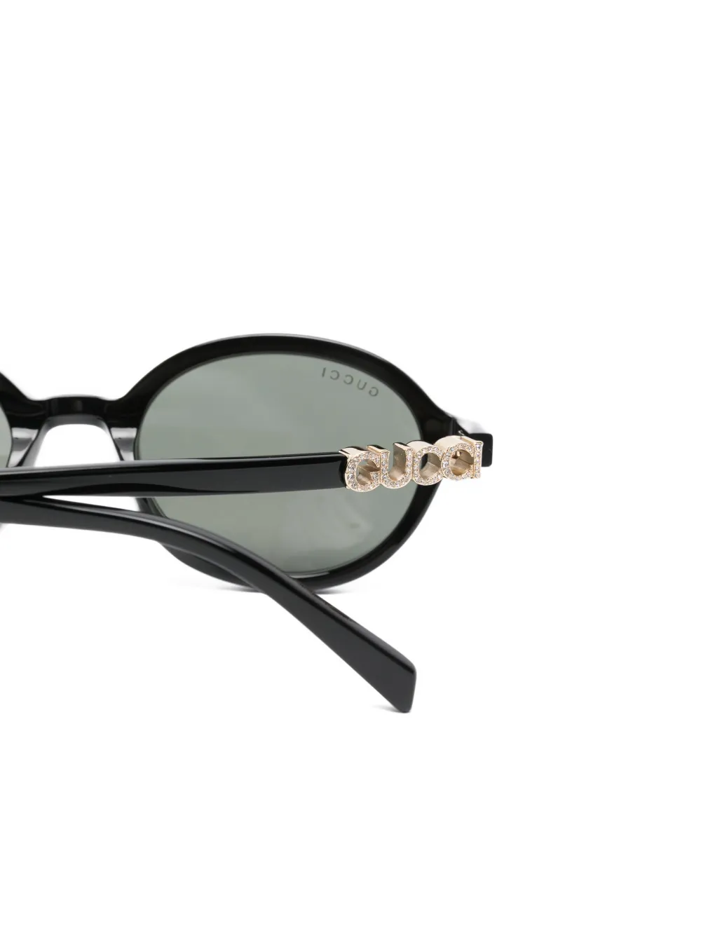 Gucci Eyewear Zonnebril met ovaal montuur en logo Zwart