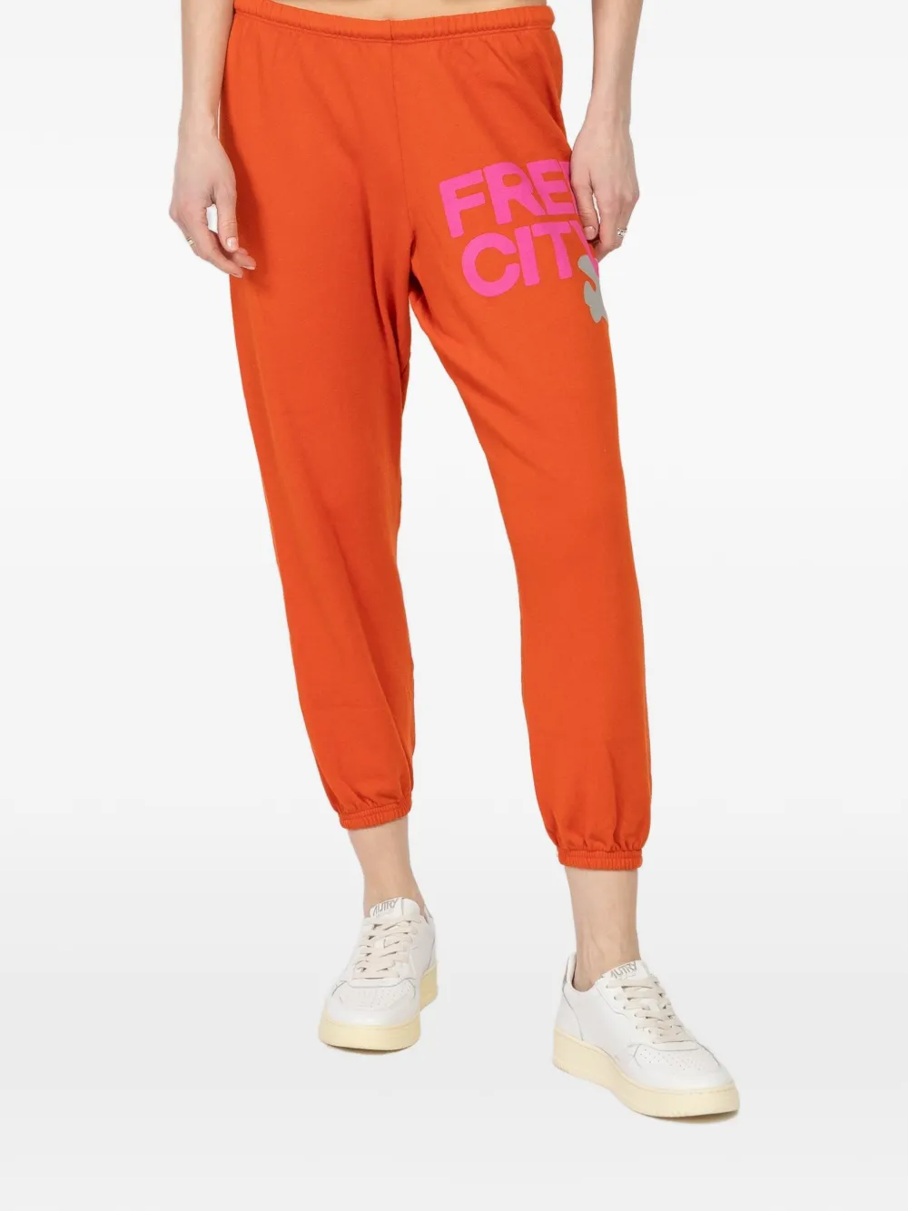 FreeCity logo-print track pants - Arancione