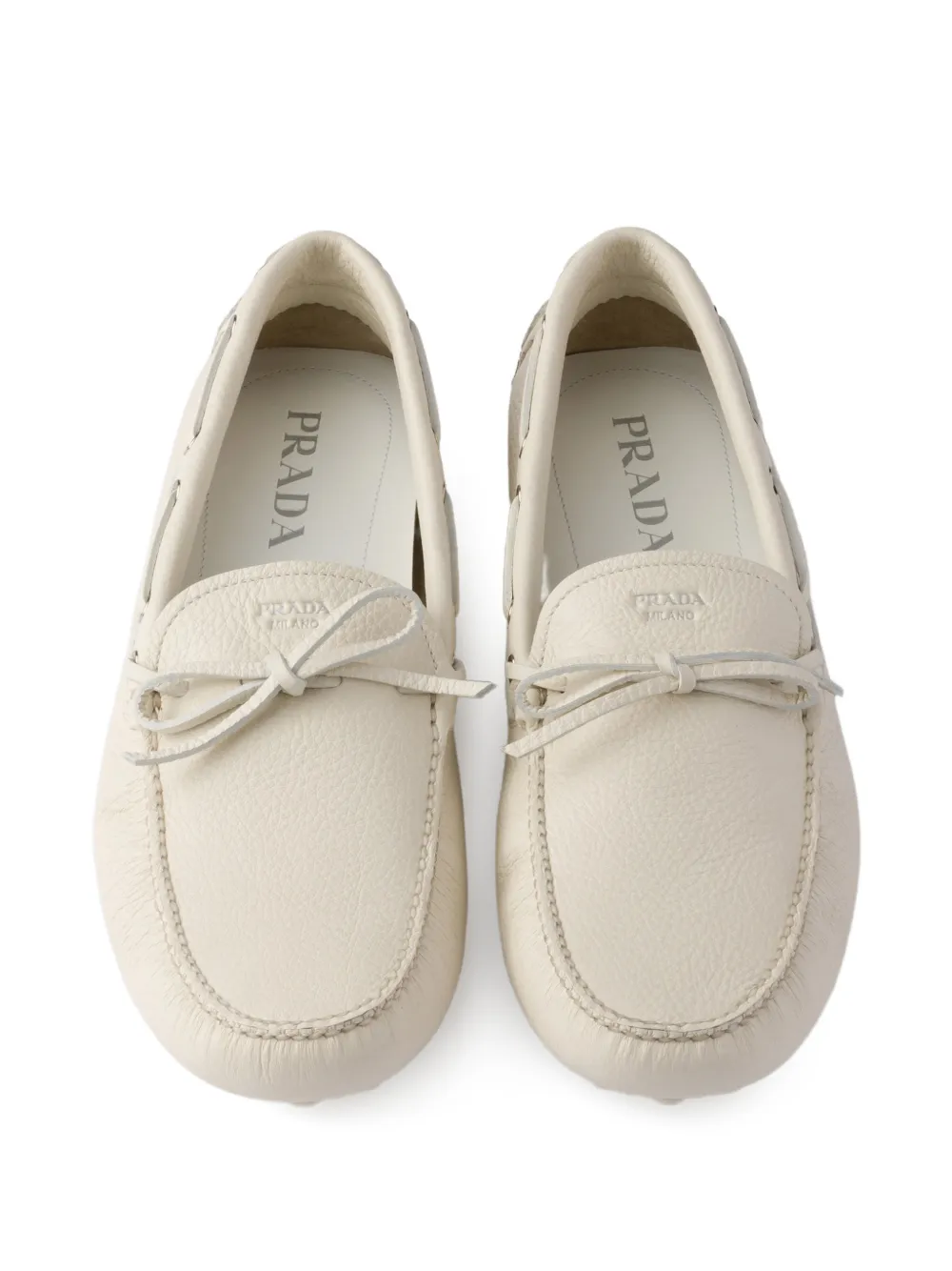 Prada Bootschoenen met gestrikt logo Beige