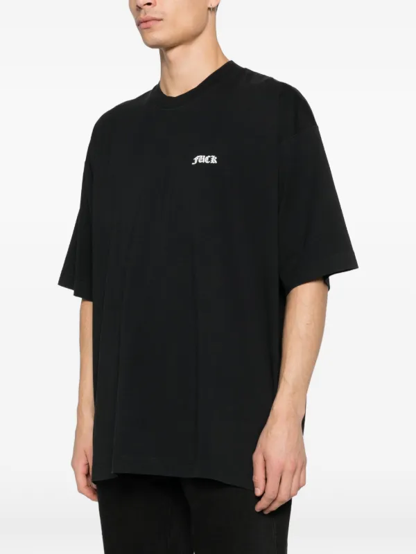 VETEMENTS lettering-print T-shirt | Black | FARFETCH JO