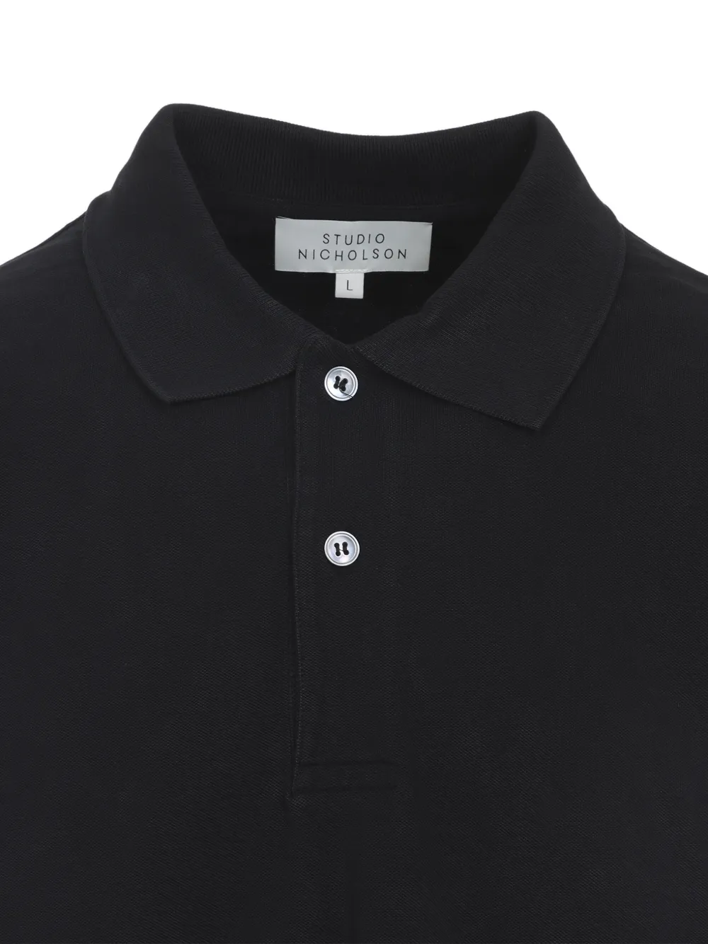 Studio Nicholson Poloshirt met korte mouwen en knoop Zwart