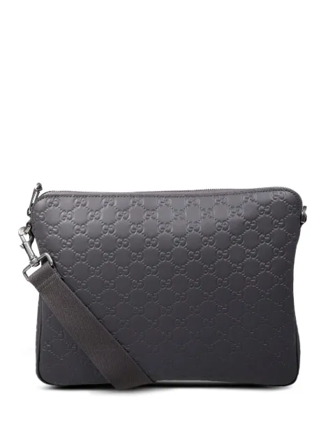 Gucci embossed messenger bag