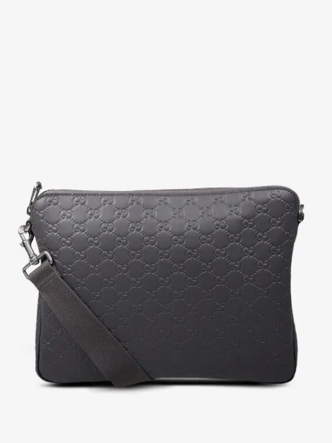 Gucci embossed messenger bag