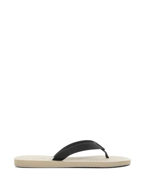 The Row Dune textured strap slides