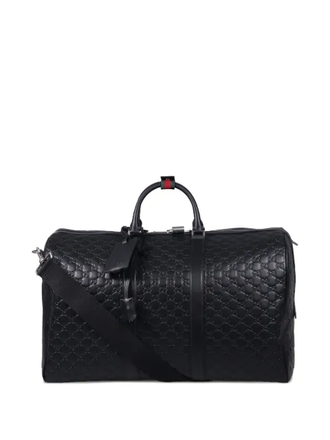 Gucci medium logo-embossing luggage duffle