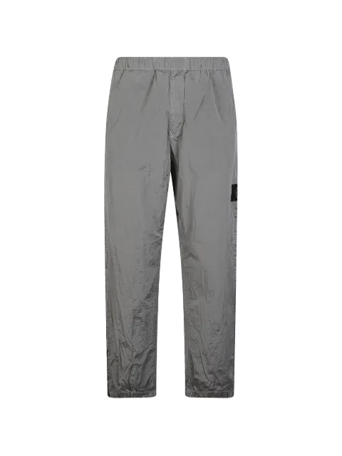 Stone Island logo-patch crinkled trousers