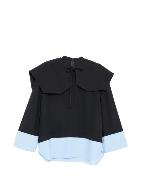 Enföld blusa con puños dobles