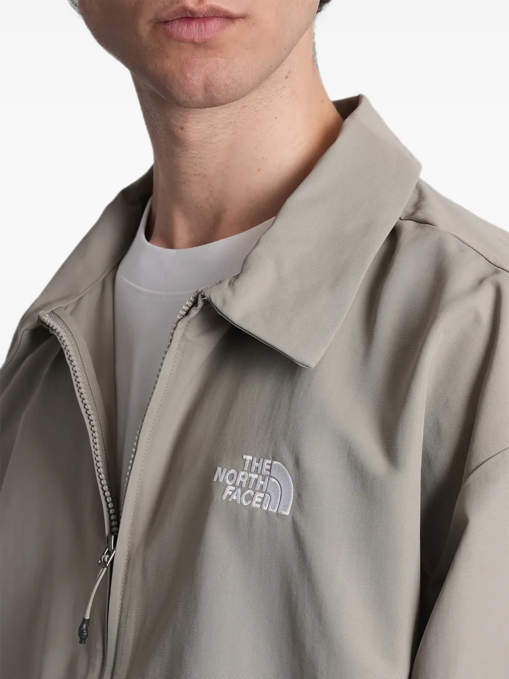 The North Face WindWall jack met logoprint Beige