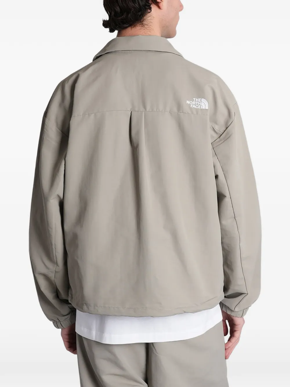 The North Face WindWall jack met logoprint Beige