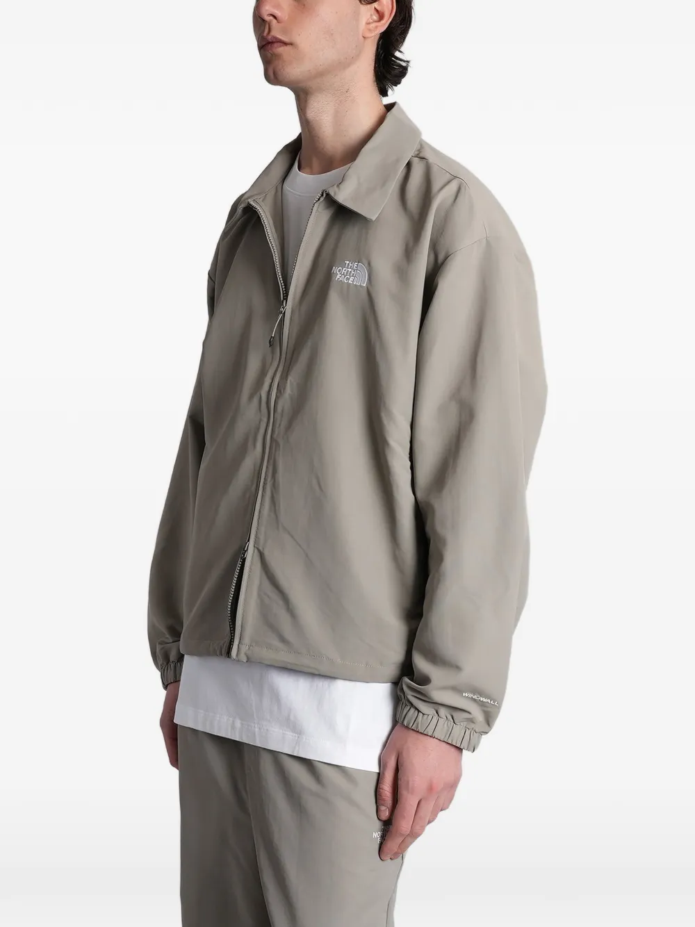 The North Face WindWall jack met logoprint Beige