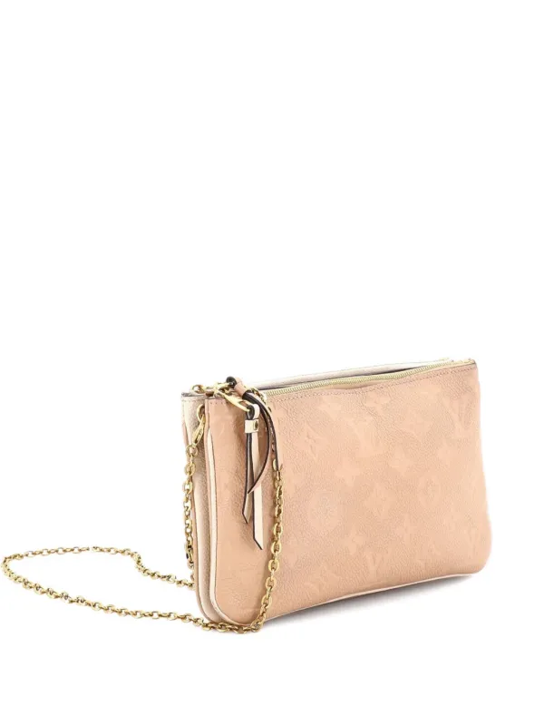 Louis Vuitton Pre-owned Double Zip Pochette Monogram Empreinte Leather Clutch Bag in Neutrals