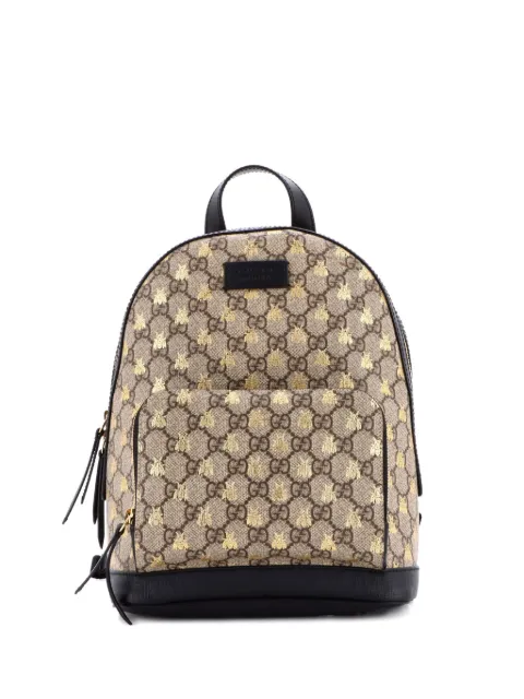 Gucci Pre-Owned mochila pequeña de lona GG revestida con cierre y estampado 