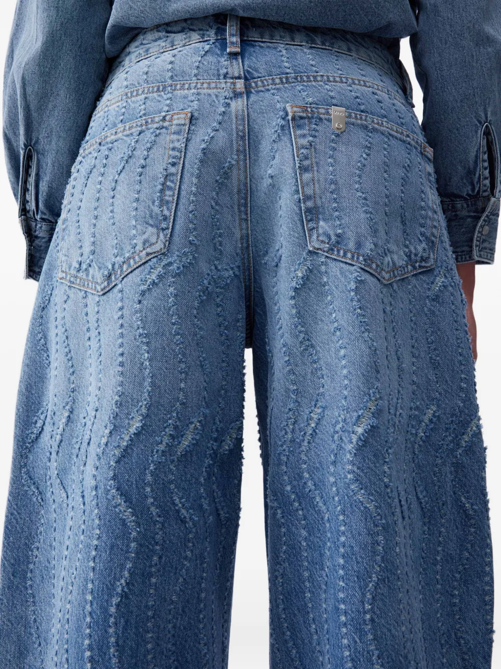 Laser-Etched Flared Jeans