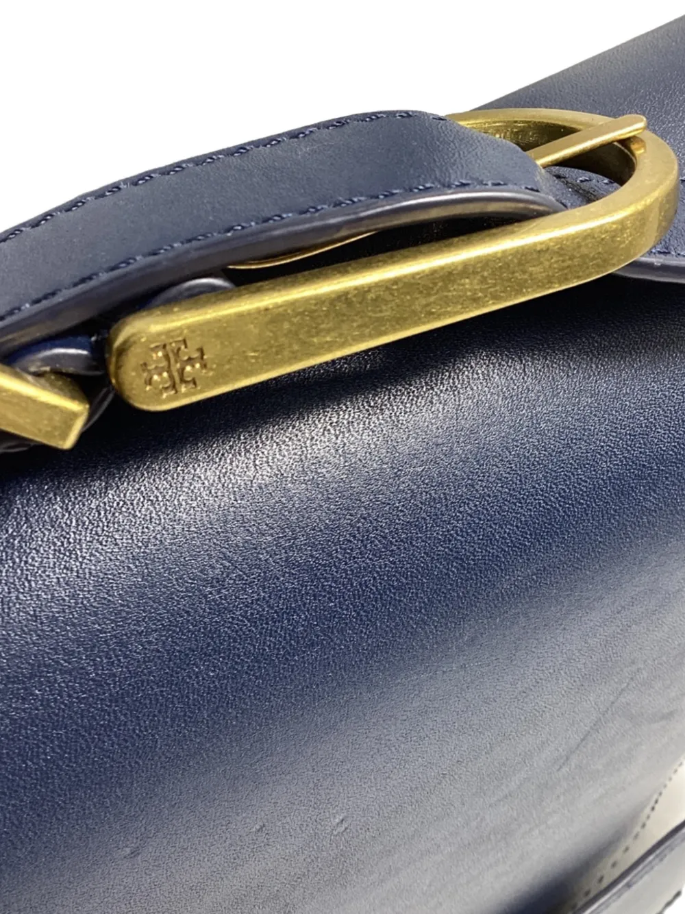 flap-top leather shoulder bag