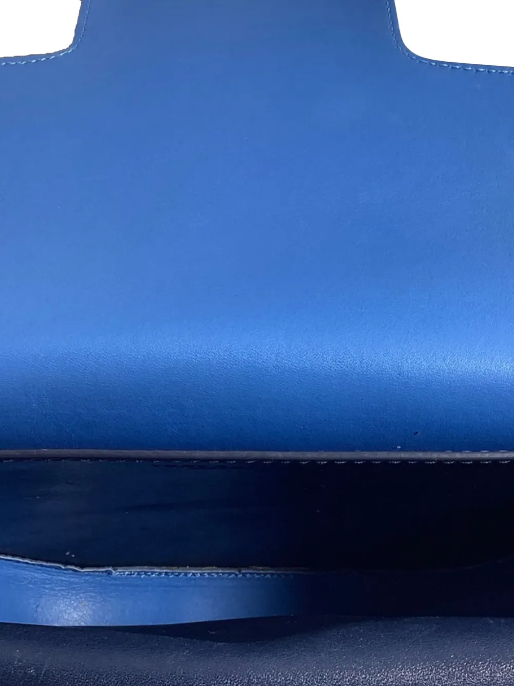 flap-top leather shoulder bag