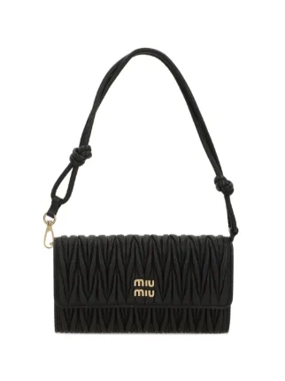 Miu Miu logo-plaque Shoulder Bag | Black | FARFETCH